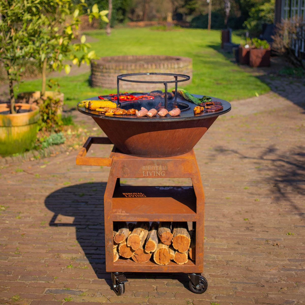 Plancha de barbecue Maestro XXL Ø80cm en acier Corten - Avec tisonnier et rangement pour le bois