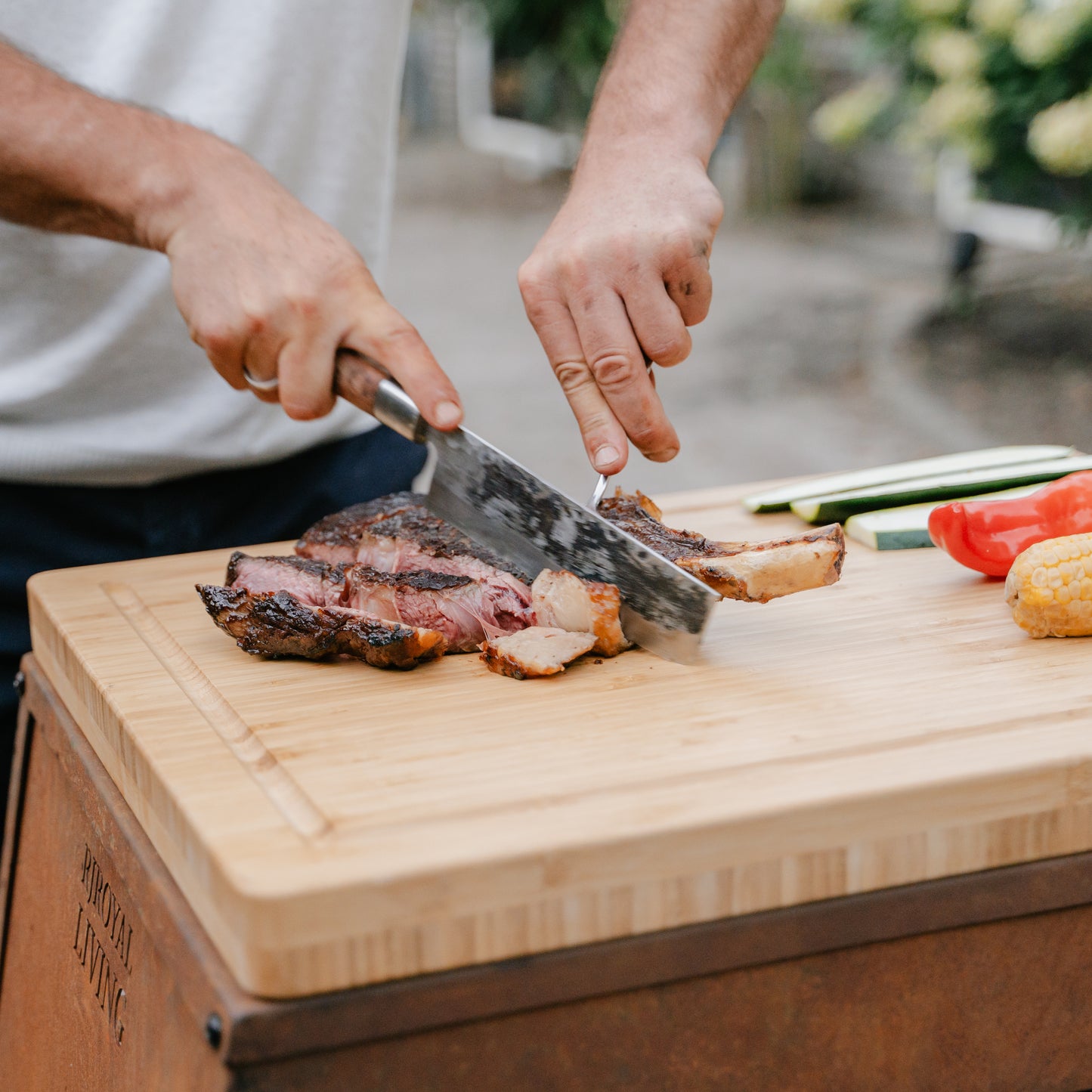 BBQ plancha table in corten steel with optional cutting board